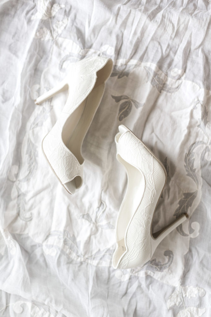 bride's vintage white lace wedding heel shoes