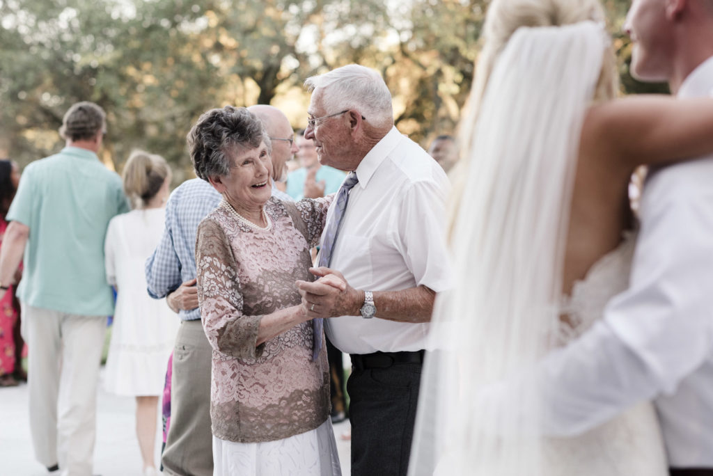bride and groom grandparents dancing at wedding reception
