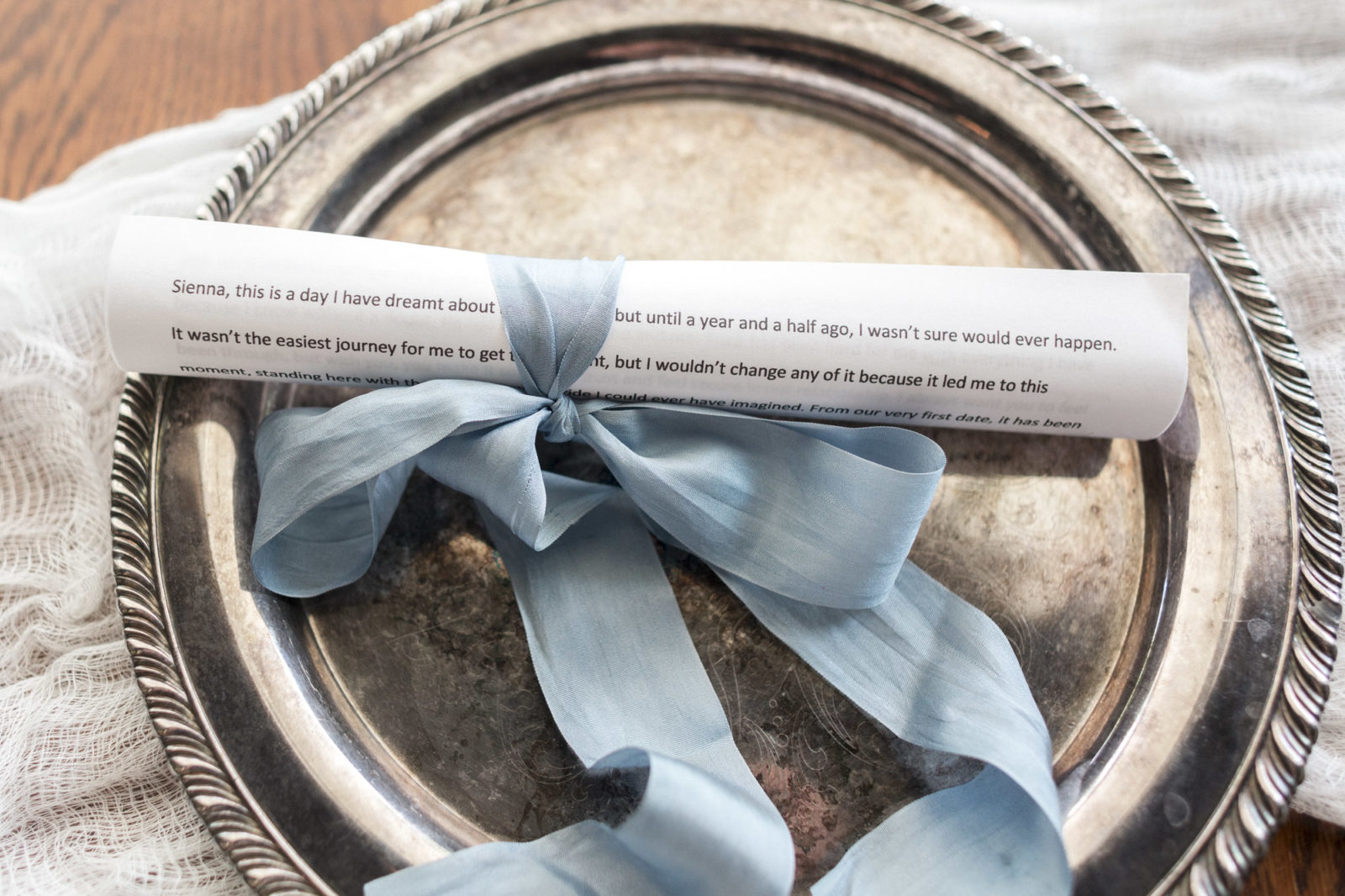 wedding vows wrapped in blue silk ribbon