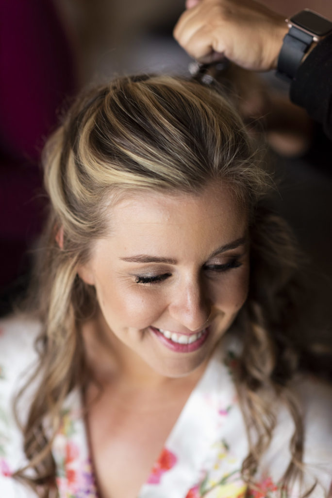 bride getting ready with help from San Luis Obispo hair and makeup artist Rhonda Johnson