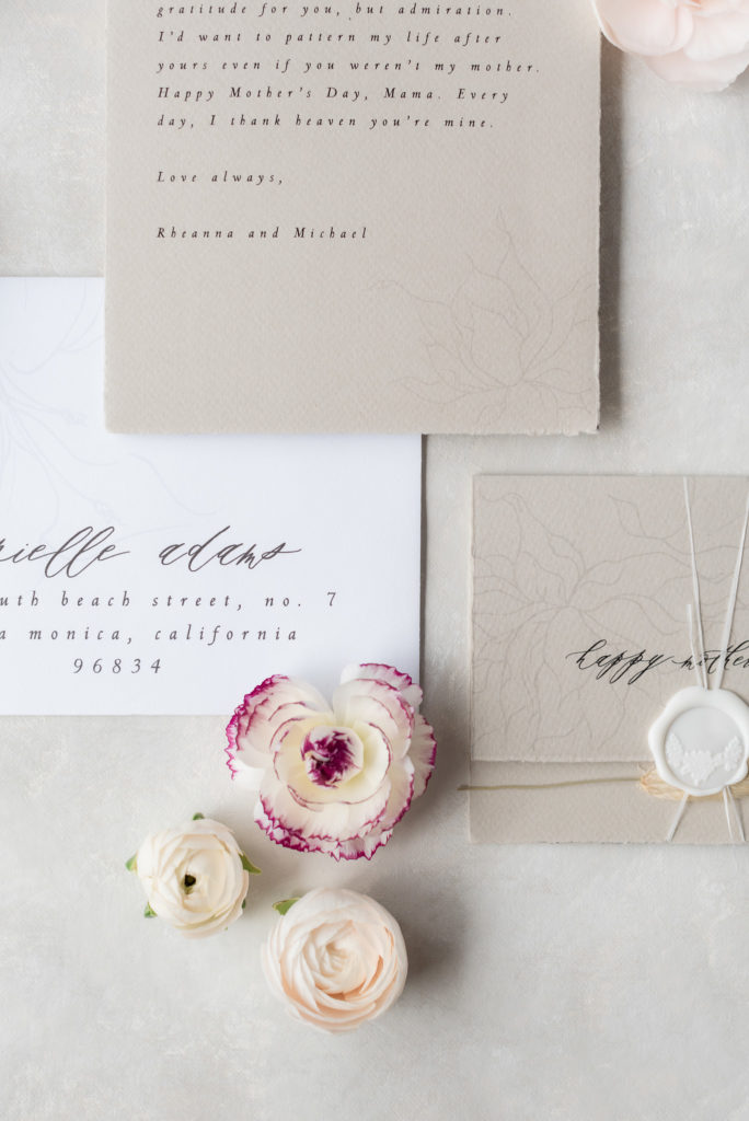 taupe deckled paper prints by central coast wedding calligrapher Fete & Quill photographed by Kirsten Bullard